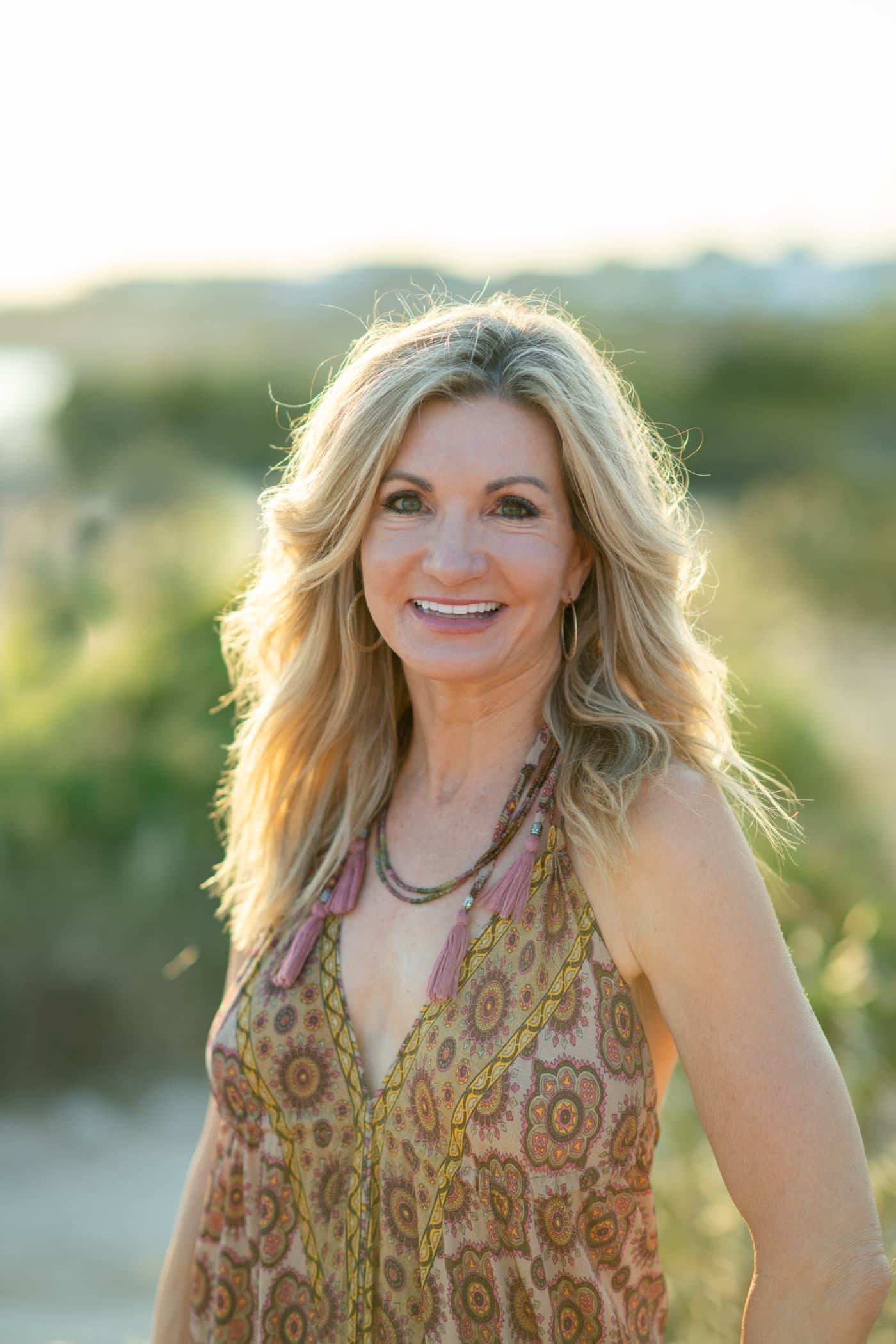 Headshot of Dr. Lisa Gold at golden hour