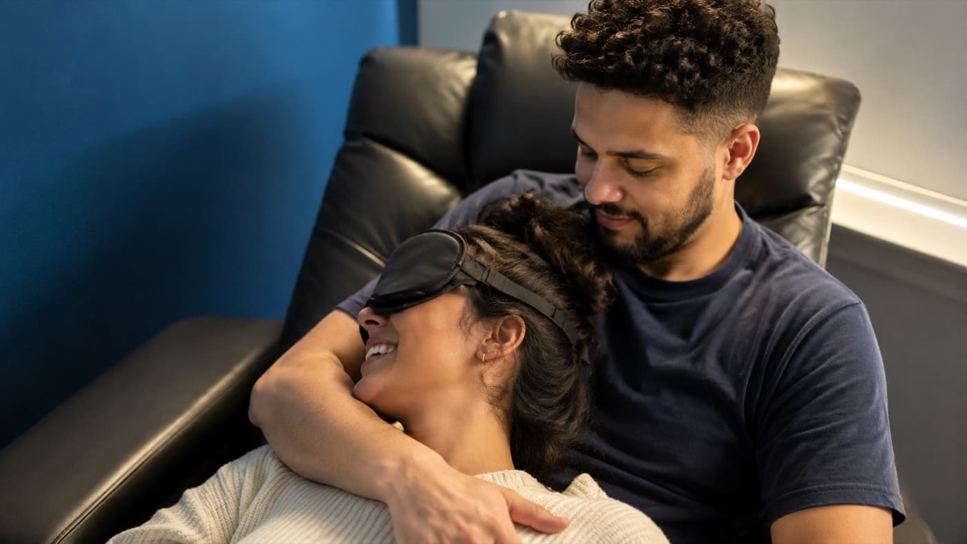 A couple supported through a psychedelic-assisted therapy session